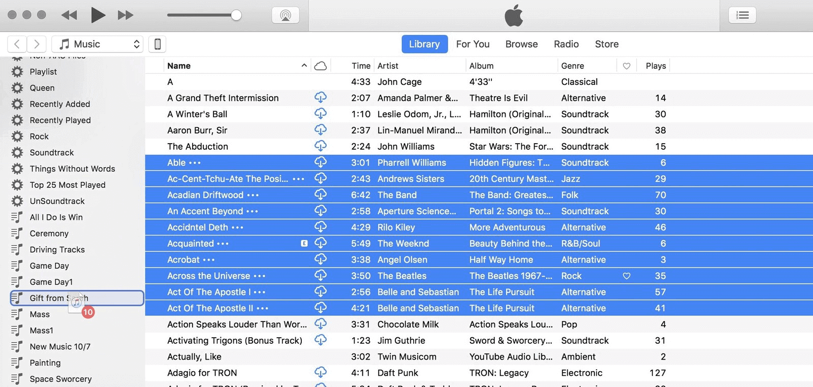trascinare i brani da regolare nella playlist di iTunes